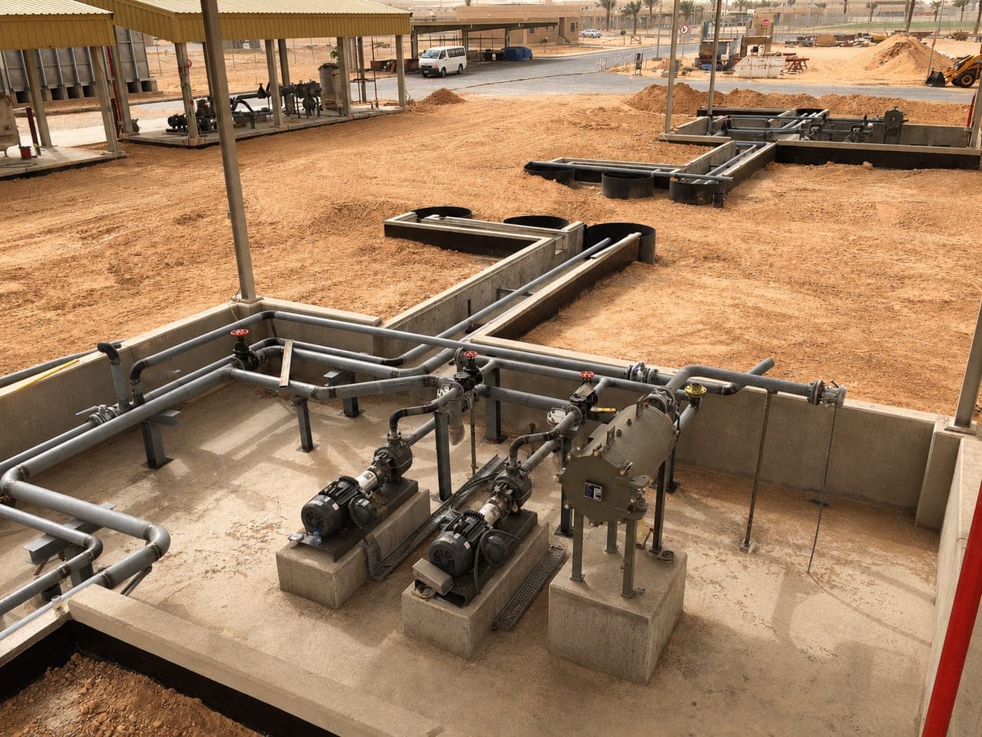 Fuel pumping skids and pipework under construction at Khashm Alan military airport, Riyadh