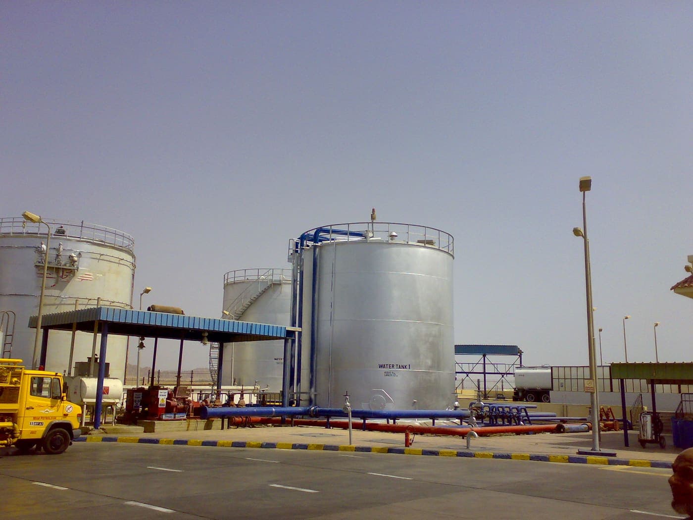 Completed fuel station overview at Sharm El-Sheikh — storage tanks and tanker canopy