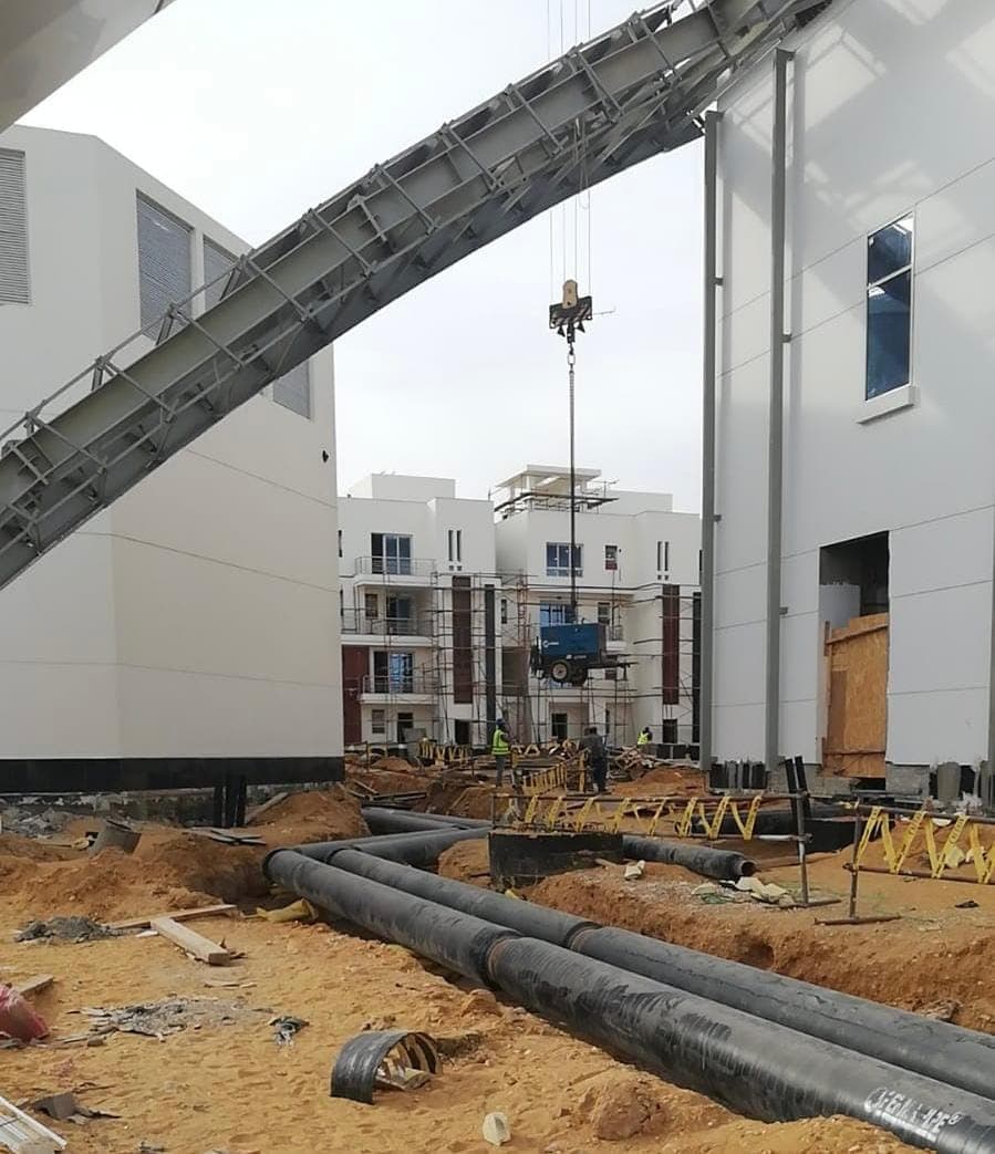 Pre-insulated pipe runs and steel structure on the Sigma Pipes headquarters site