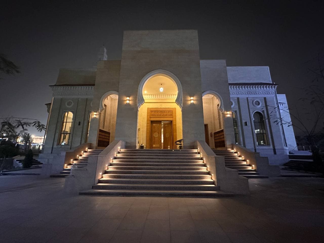 Masjid Al-Emam Al-Zahabi — illuminated entrance at night
